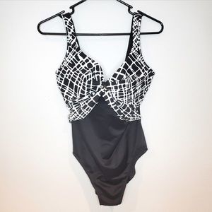 Miraclesuit swimsuit. Great condition. Super cute and slimming.